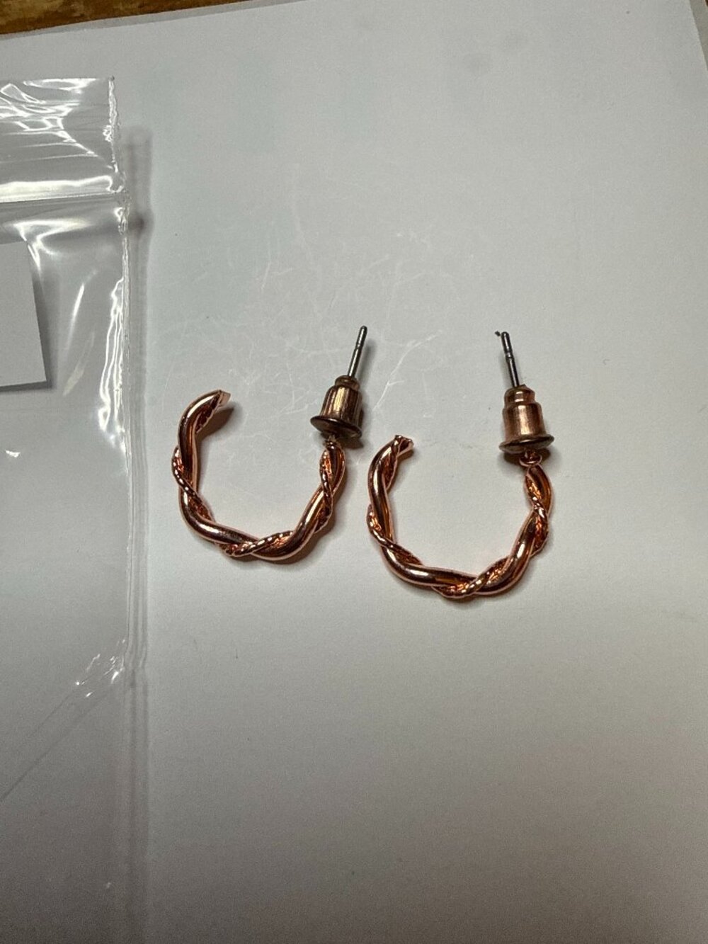 rose gold twisted hoop earrings, bell back